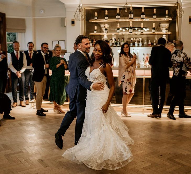 First dance with black bride in Riki Dalal wedding dress and Irish Groom in navy suit