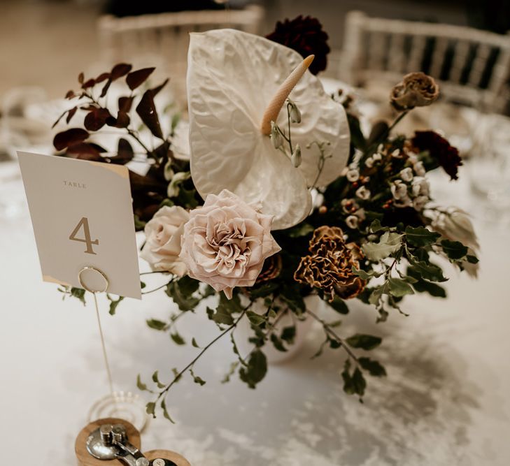 Flower Centrepiece with white tropical Anthurium flowers and roses