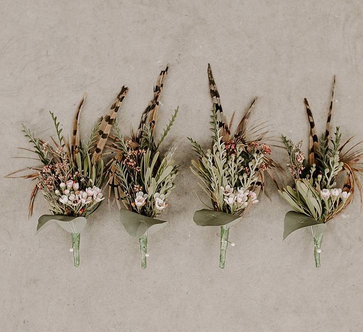 Wedding buttonholes to match Protea bouquet