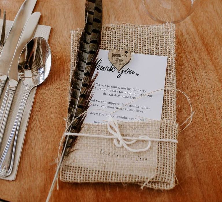 Feather detail wedding place setting