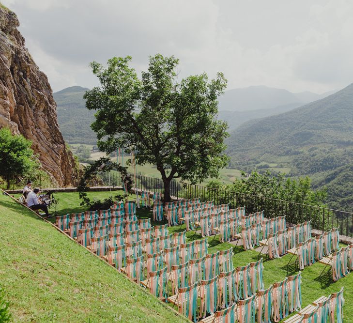 Outdoor Wedding Ceremony at Castello di Naro in Italy with Ribbon Chair Back Detail