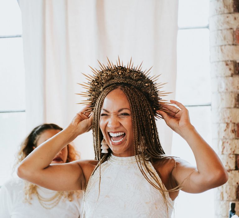 bride wearing a structured gold bridal crown on wedding day