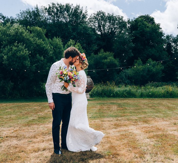 Bride In Brightly Colour Flower Crown // Image By Casey Avenue Photography