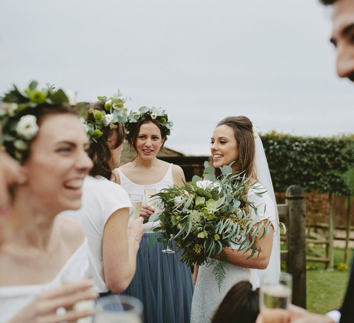 Bridesmaids In Cornflower Blue For Winter Wedding At Cripps Barn // Images David Jenkins Photography // Bride In Stewart Parvin Dress