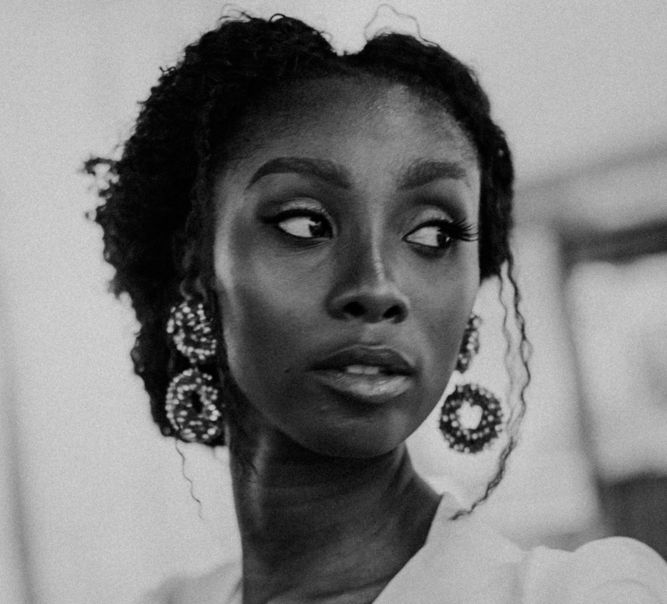 Beautiful Black Bride with Bridal Updo and Dangling Earrings