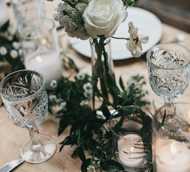 White Wedding Flower Stems in Glass Votive