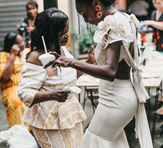 Bride and Mother of the Bride Dancing Together