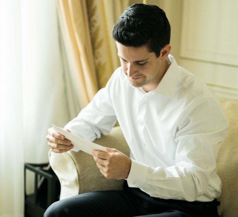 Groom Reading a Letter on the Morning of the Wedding