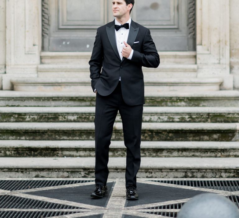 Soave Groom in Black Tie Wedding Suit