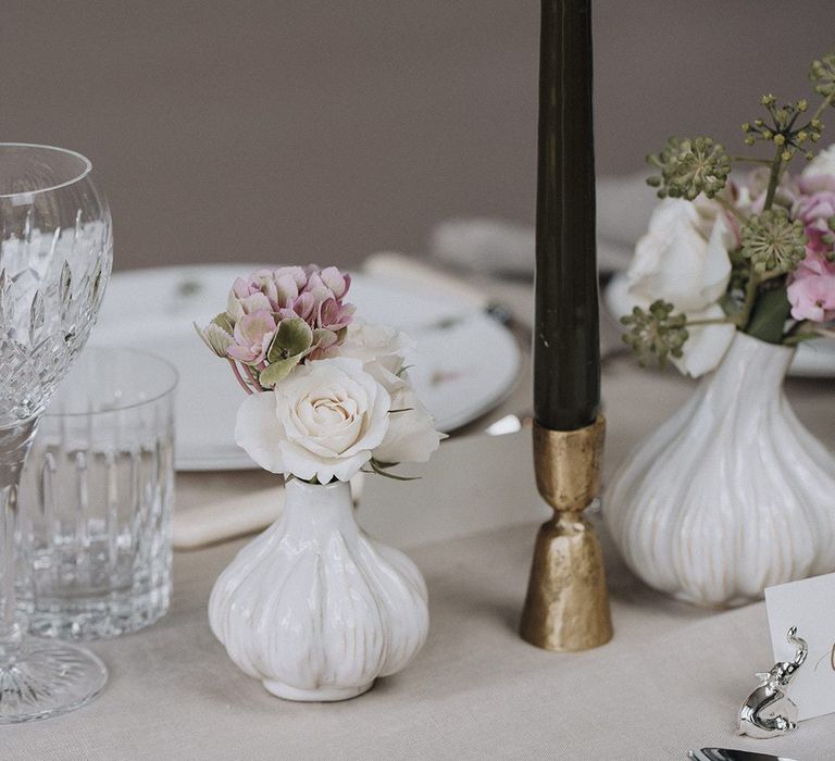 White ceramic bud vases for tablescape styled by By Cheani