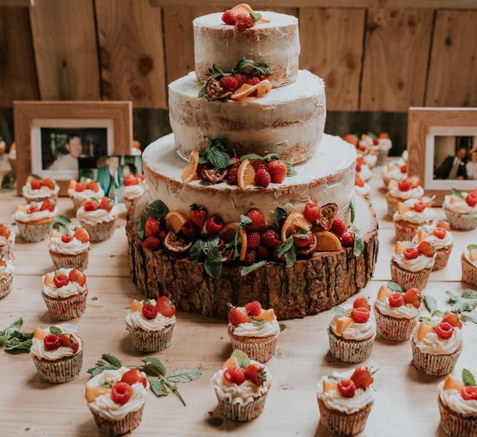 Cupcakes and semi-naked wedding cake