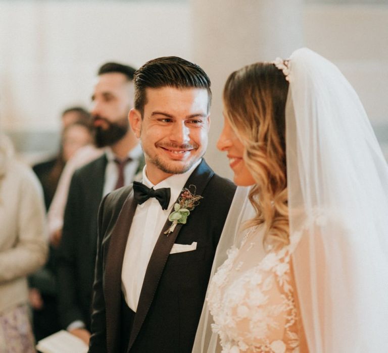 Bride and groom meet at the altar for destination wedding