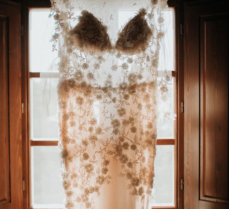 Stunning appliqué wedding dress with sleeves