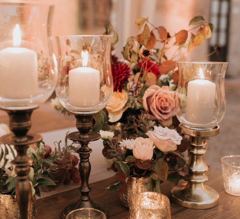 Stunning wedding table decor with blush roses and candles