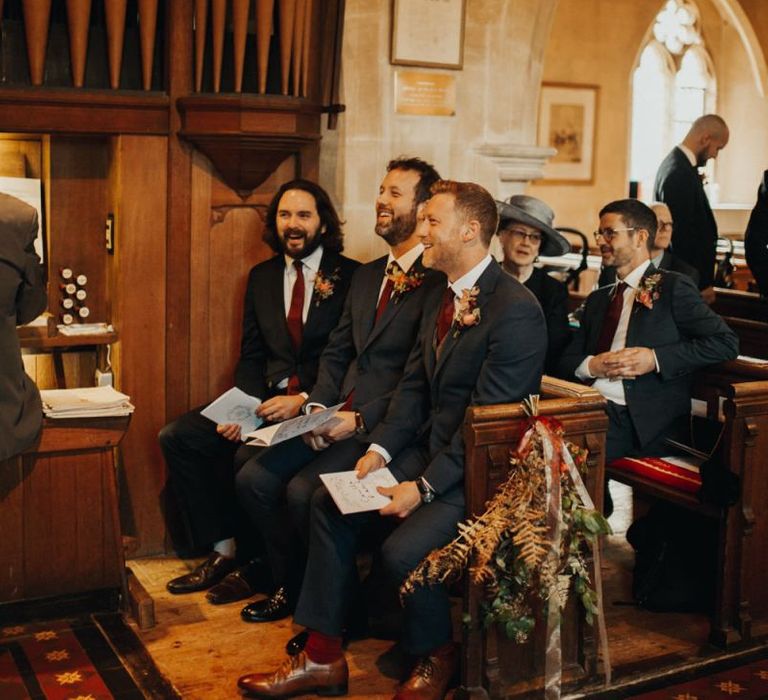 Groom and guests wait for bride's arrival