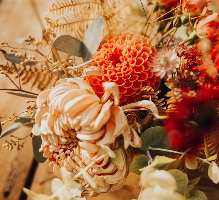 Orange and red wedding flowers