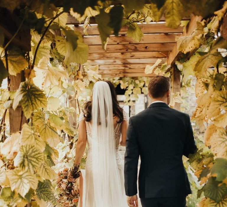 Maggie Sottero wedding dress with veil