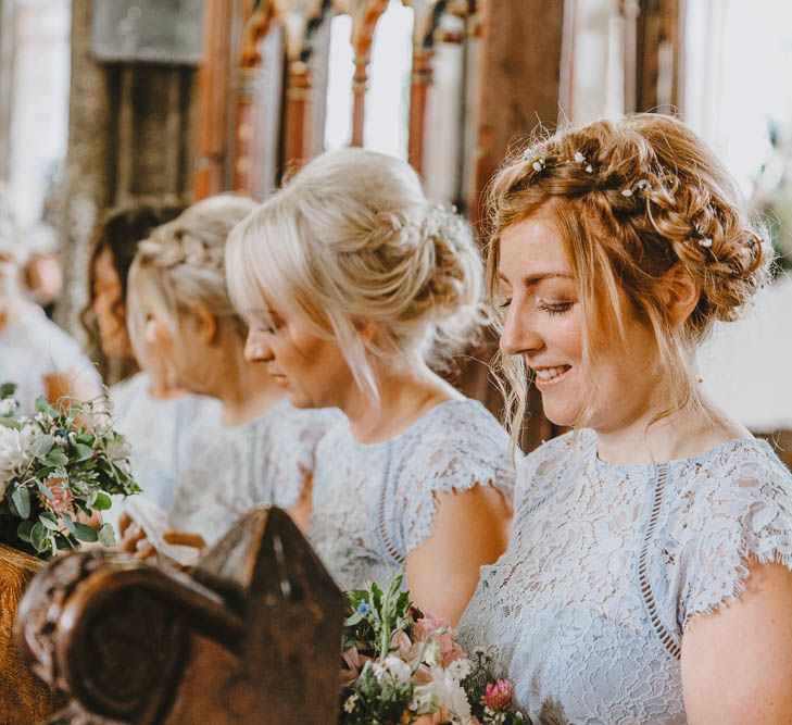 Church Wedding Ceremony with Bridesmaids in Pale Blue Lace Dresses from Debenhams