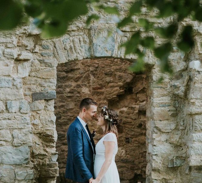 Bride in flower crown with groom