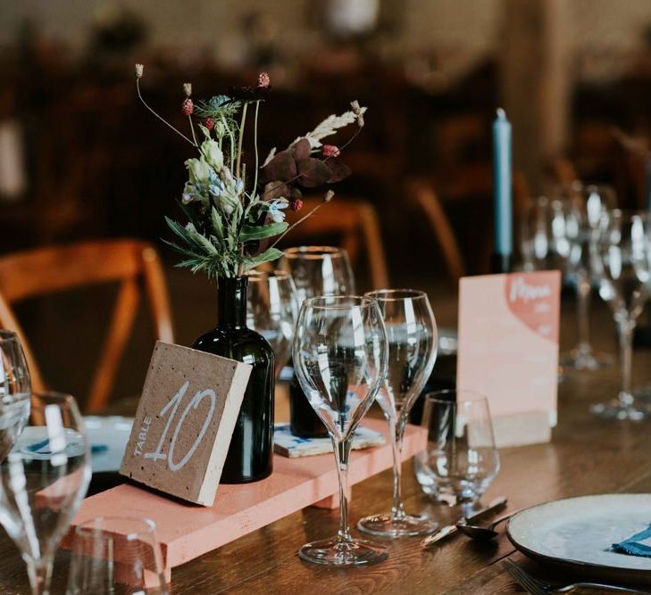 Table numbers with candles and flower table decor