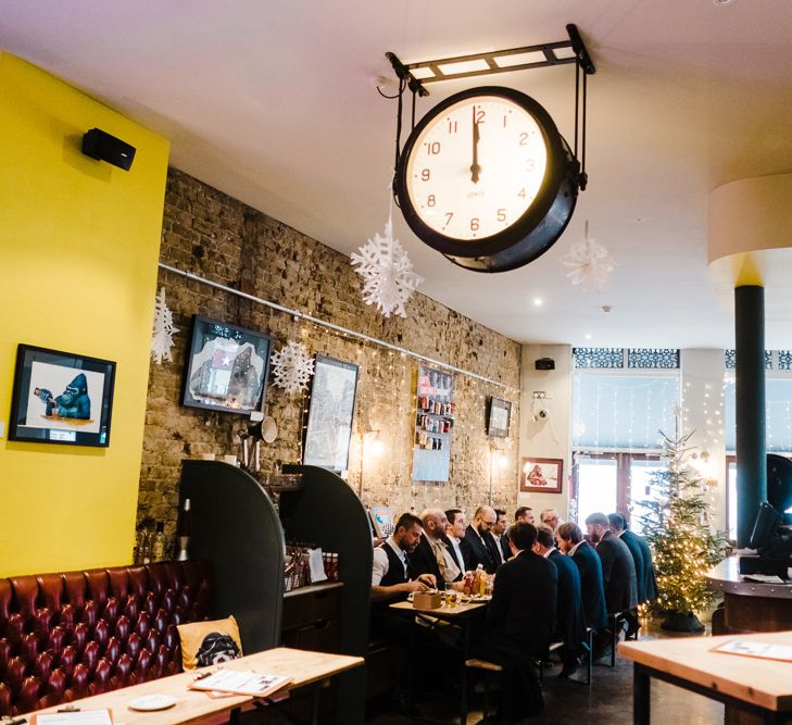 Groomsmen | Groom in Chester Barrie Tweed Suit | Candle Lit Christmas Wedding at Gray's Inn London with Christmas Carols &amp; Festive Wreaths | John Barwood Photography