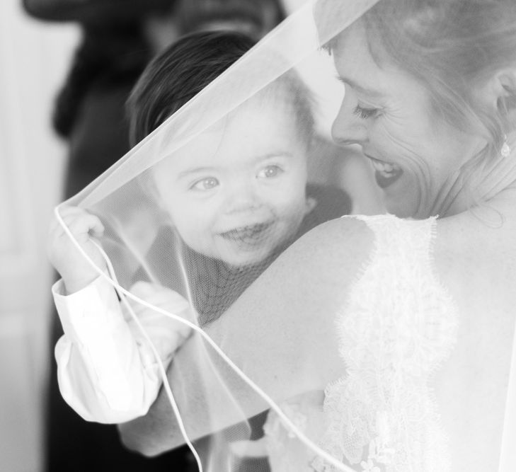 Mother and Son | Candle Lit Christmas Wedding at Gray's Inn London with Christmas Carols &amp; Festive Wreaths | John Barwood Photography