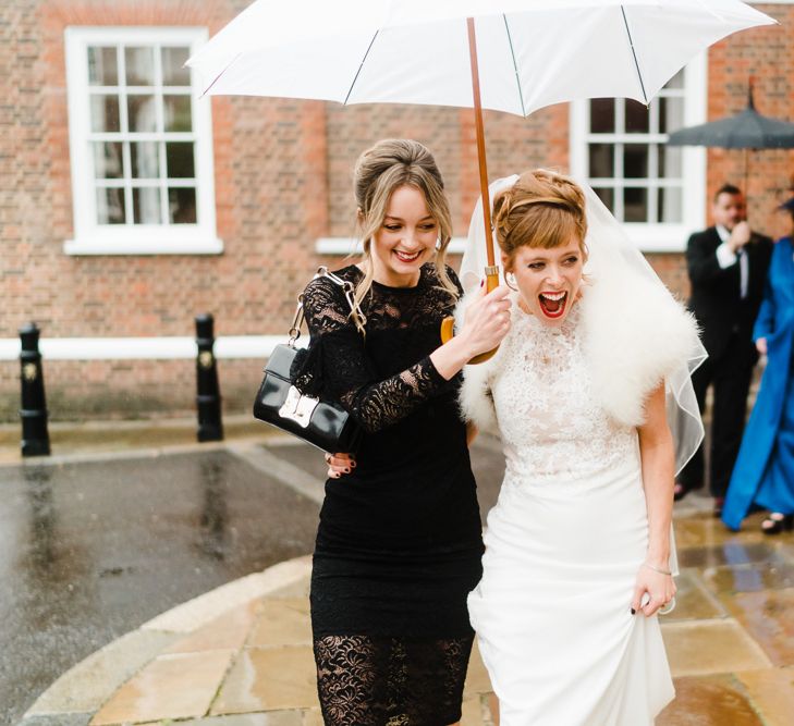 Bride in Lace San Patrick Wedding Dress | Bridesmaid in Black Dress | Candle Lit Christmas Wedding at Gray's Inn London with Christmas Carols &amp; Festive Wreaths | John Barwood Photography