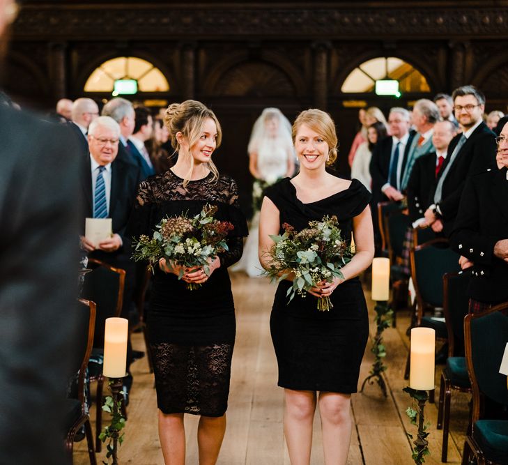 Wedding Ceremony | Bridesmaids in Black High Street Dresses | Candle Lit Christmas Wedding at Gray's Inn London with Christmas Carols &amp; Festive Wreaths | John Barwood Photography