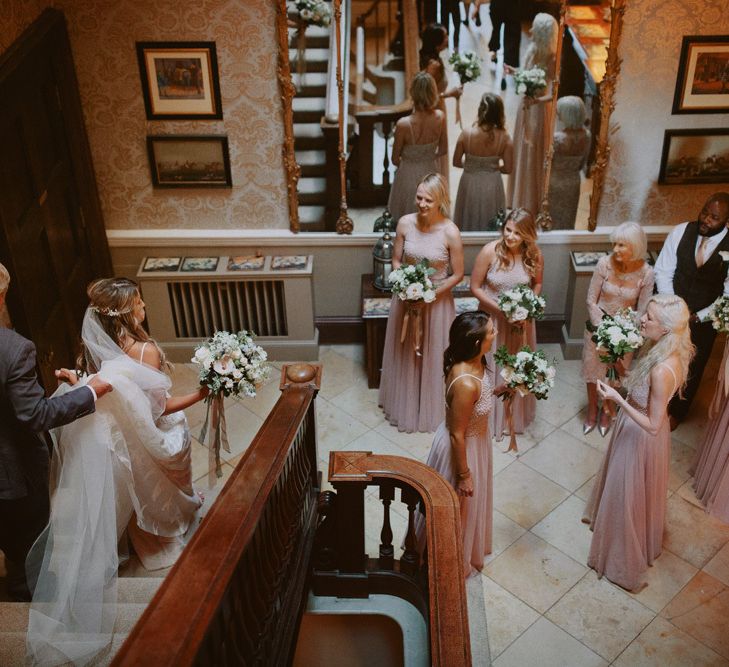 Bride makes her way to Kirtlington Park wedding ceremony