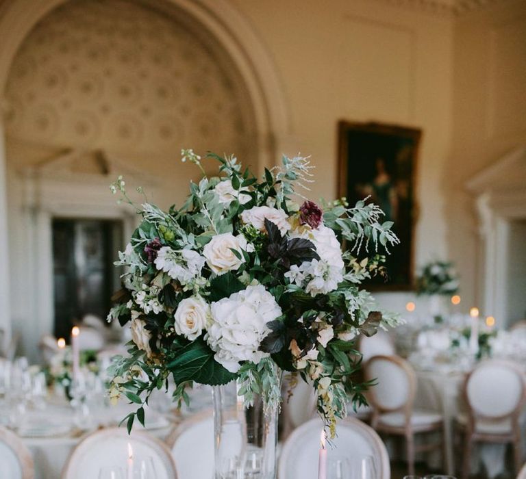 Tall wedding table centrepieces at Kirtlington Park wedding