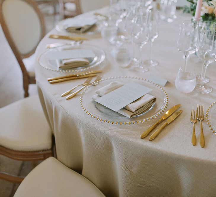 Gold wedding table decor at Kirtlington Park wedding