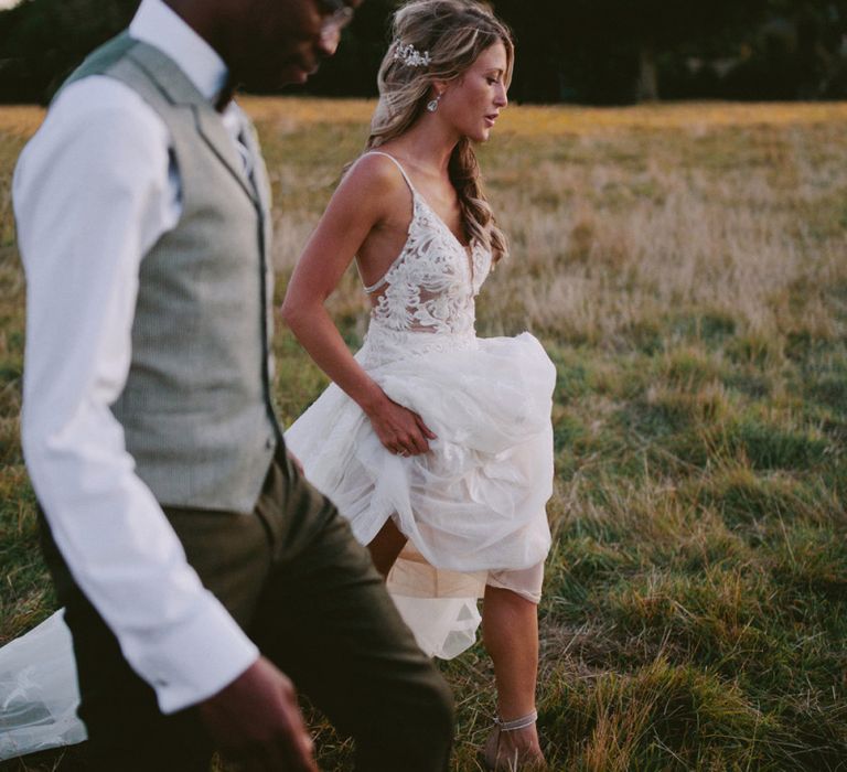 Groom wears grey waistcoat for Kirtlington Park wedding