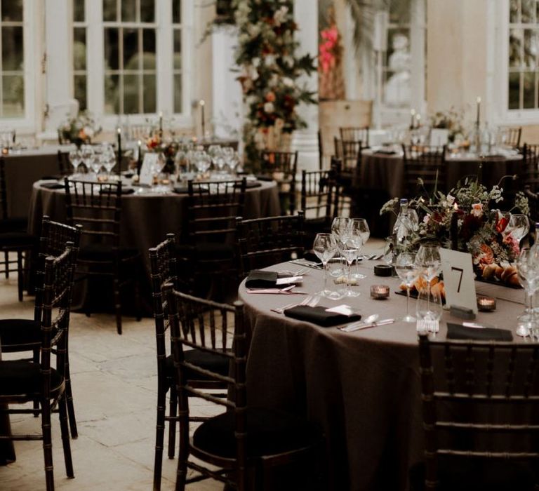 Black wedding reception table cloths and chairs at Syon park wedding