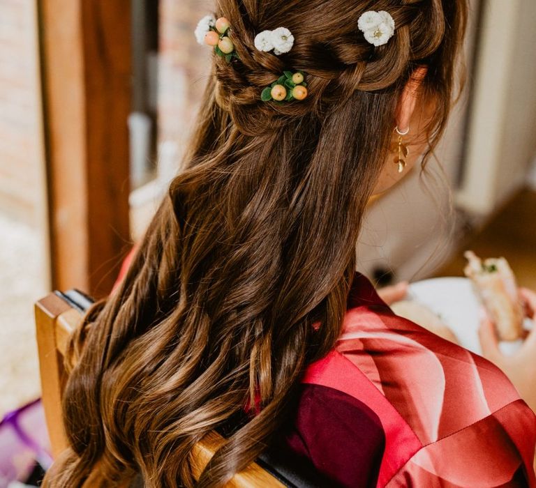 Brides half up half down hair with flowers