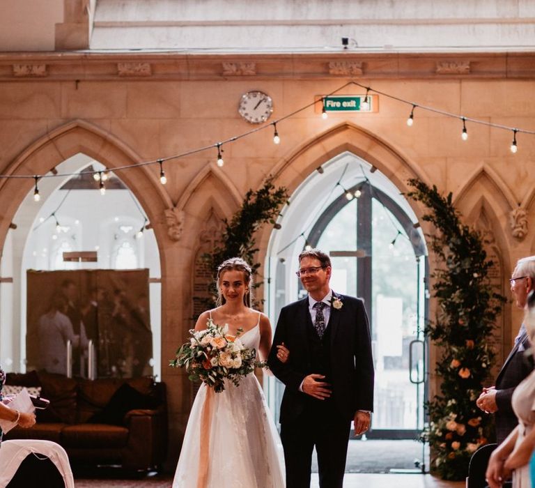 church wedding ceremony bridal entrance in Essense of Australia wedding dress