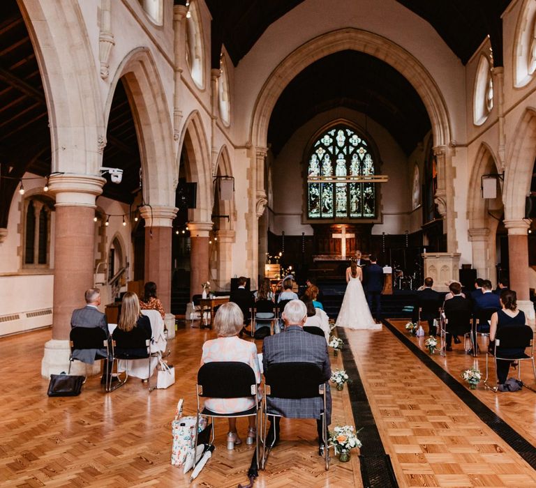 Socially distanced 2020 wedding ceremony in a church