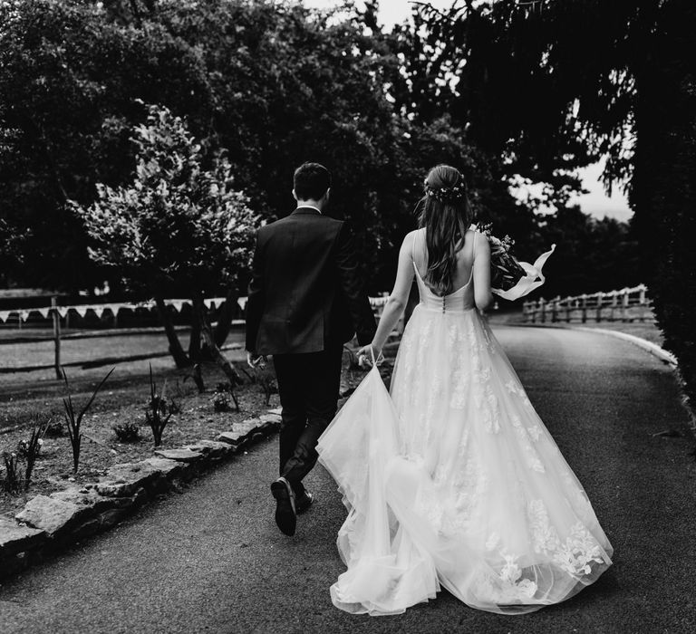 Bride in Essense of Australia wedding dress with lace detail