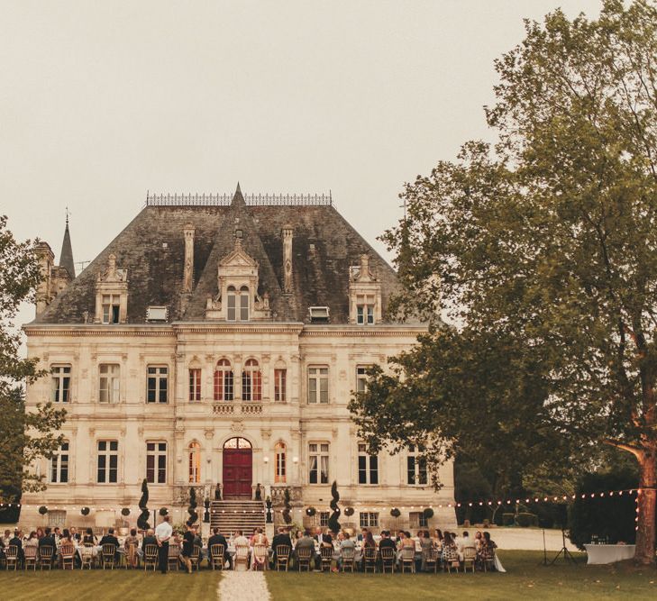 Wedding breakfast outside French chateau venue