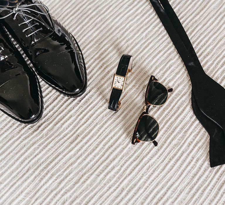 Groom accessories for black and white wedding