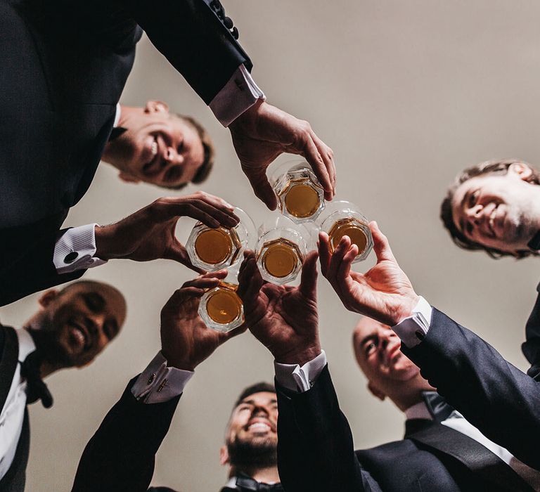 Groom and groomsmen make a toast