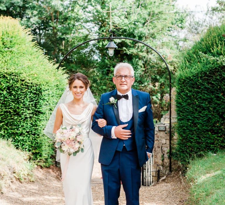 Bride and Father arrives at wedding ceremony