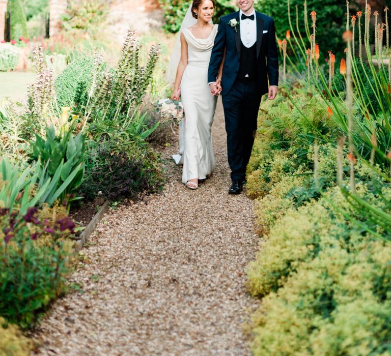 Bride and groom in the grounds of Four Seasons Hampshire