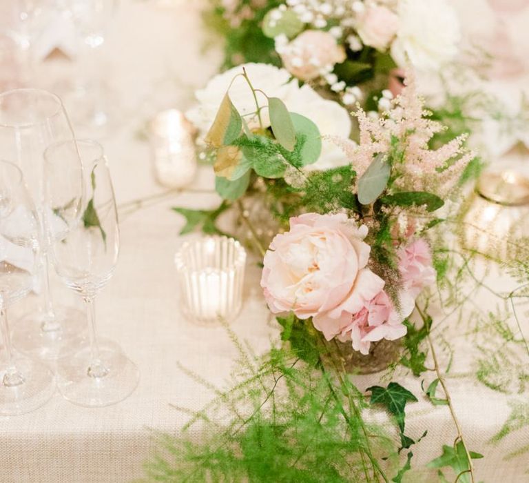 Blush wedding flowers and table decor