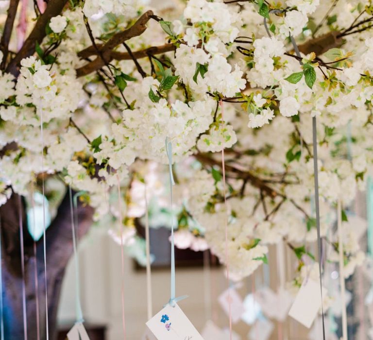 Hanging escort cards for wedding guests