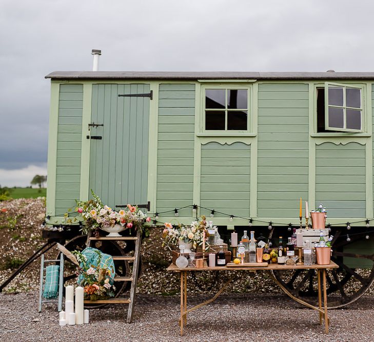 Shepherds Hut Bar For Wedding // Environmentally Conscious Wedding Venue Casterley Barn In Wiltshire Organic Working Farm Stylish Barn Wedding Venue Images Lydia Stamps