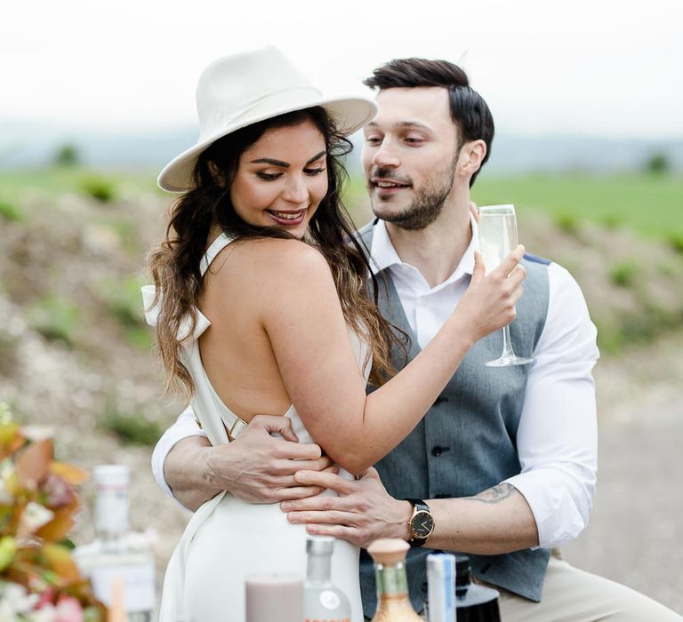 Bride In Jumpsuit &amp; Felt Hat // Environmentally Conscious Wedding Venue Casterley Barn In Wiltshire Organic Working Farm Stylish Barn Wedding Venue Images Lydia Stamps