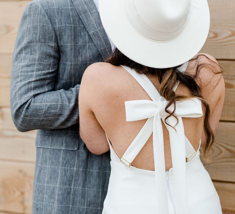 Bride In Felt Hat // Environmentally Conscious Wedding Venue Casterley Barn In Wiltshire Organic Working Farm Stylish Barn Wedding Venue Images Lydia Stamps