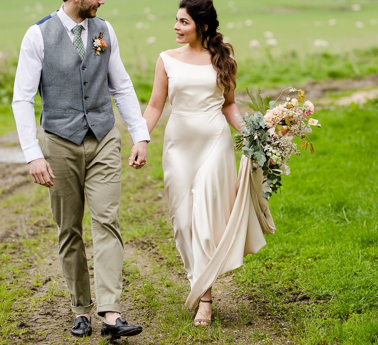 Tara Bradley Birt Bridal Wear // Environmentally Conscious Wedding Venue Casterley Barn In Wiltshire Organic Working Farm Stylish Barn Wedding Venue Images Lydia Stamps