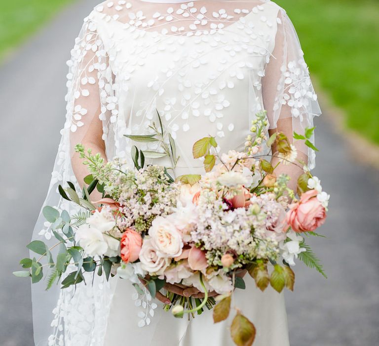 Pastel Wedding Bouquet With Roses // Environmentally Conscious Wedding Venue Casterley Barn In Wiltshire Organic Working Farm Stylish Barn Wedding Venue Images Lydia Stamps