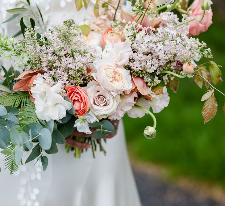 Pastel Wedding Bouquet With Roses // Environmentally Conscious Wedding Venue Casterley Barn In Wiltshire Organic Working Farm Stylish Barn Wedding Venue Images Lydia Stamps